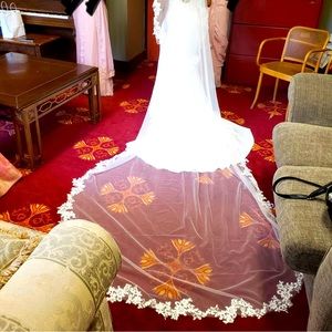 Ivory cathedral length wedding veil